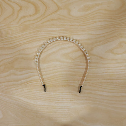 Pearl hairband worn by model