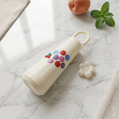 Close-up of bottle handle and flower charm