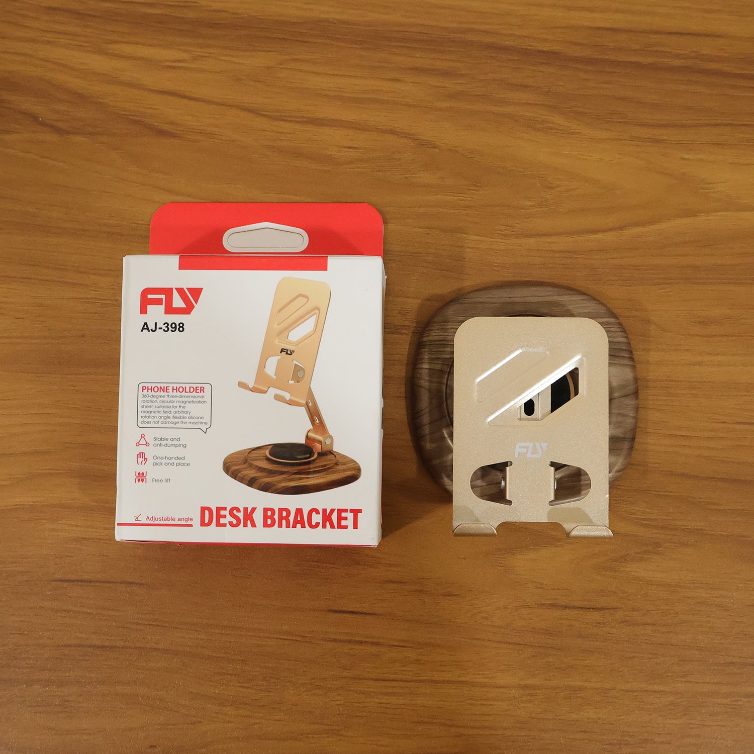 Foldable desk phone holder in live use