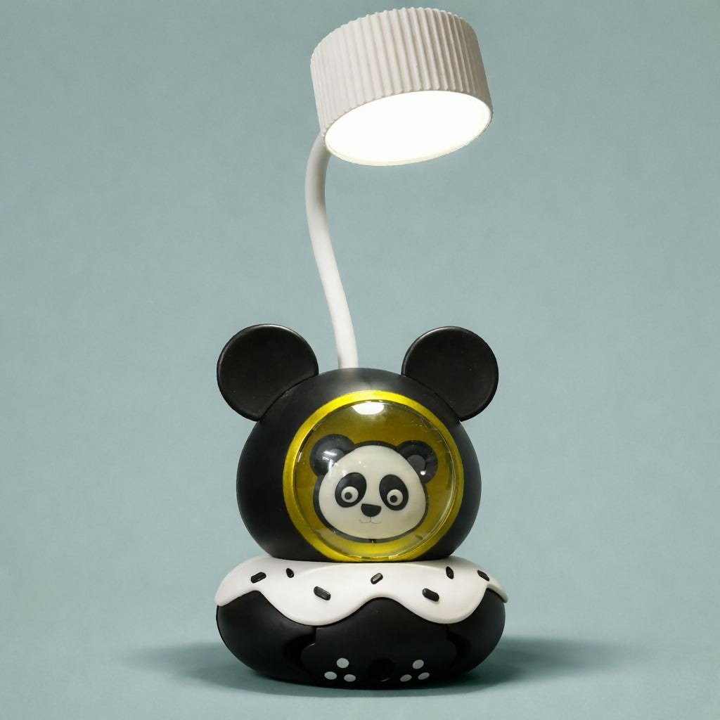 A black and white panda lamp with a flexible neck and round base is centered against a light blue wall.