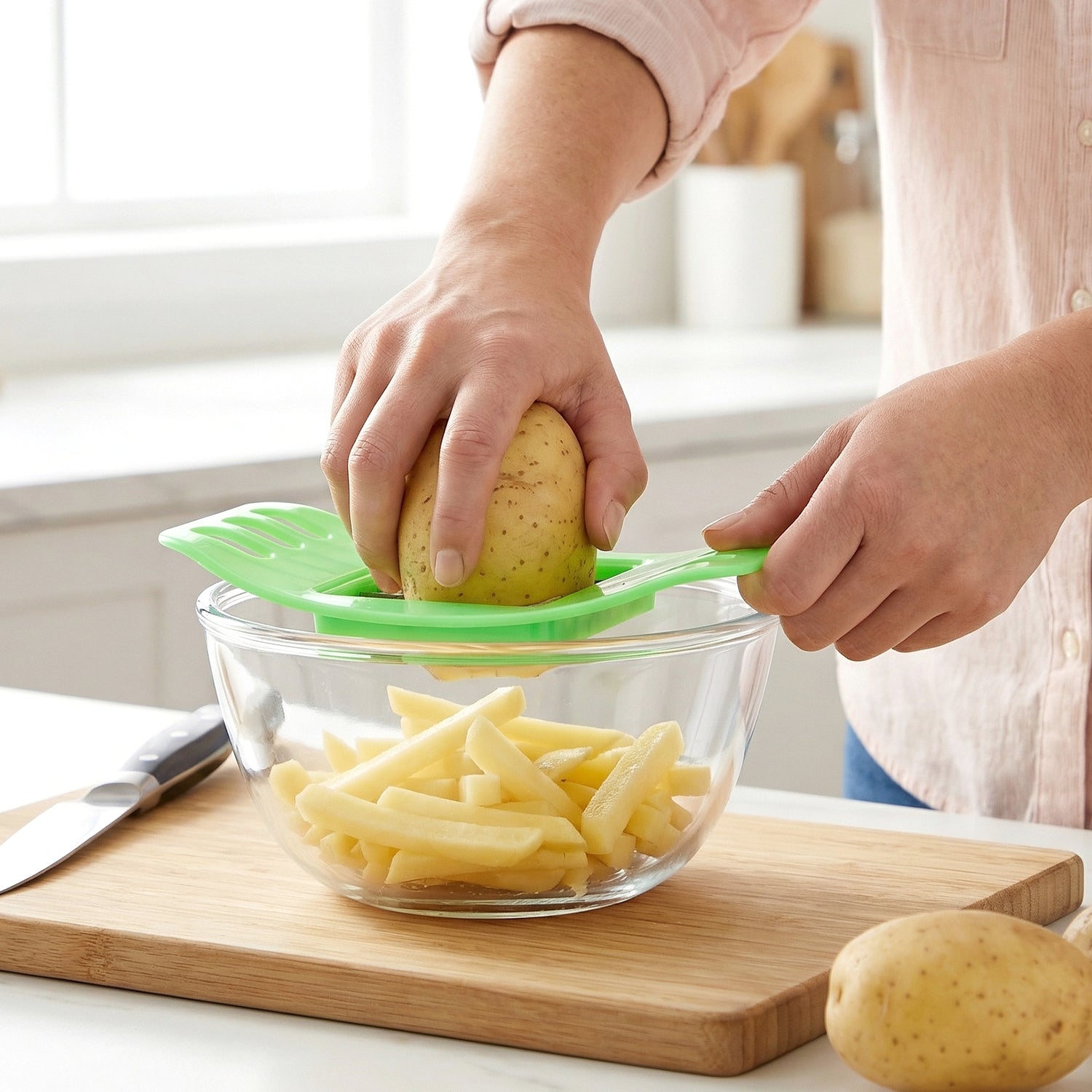 Potato cutter with sliced potatoes after use
