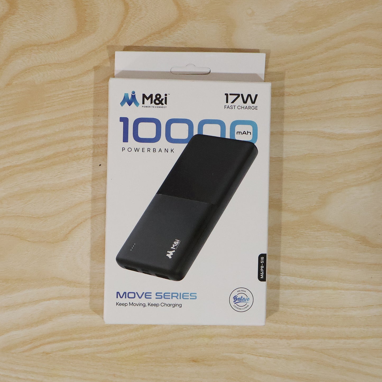Power bank placed beside smartphones for size comparison