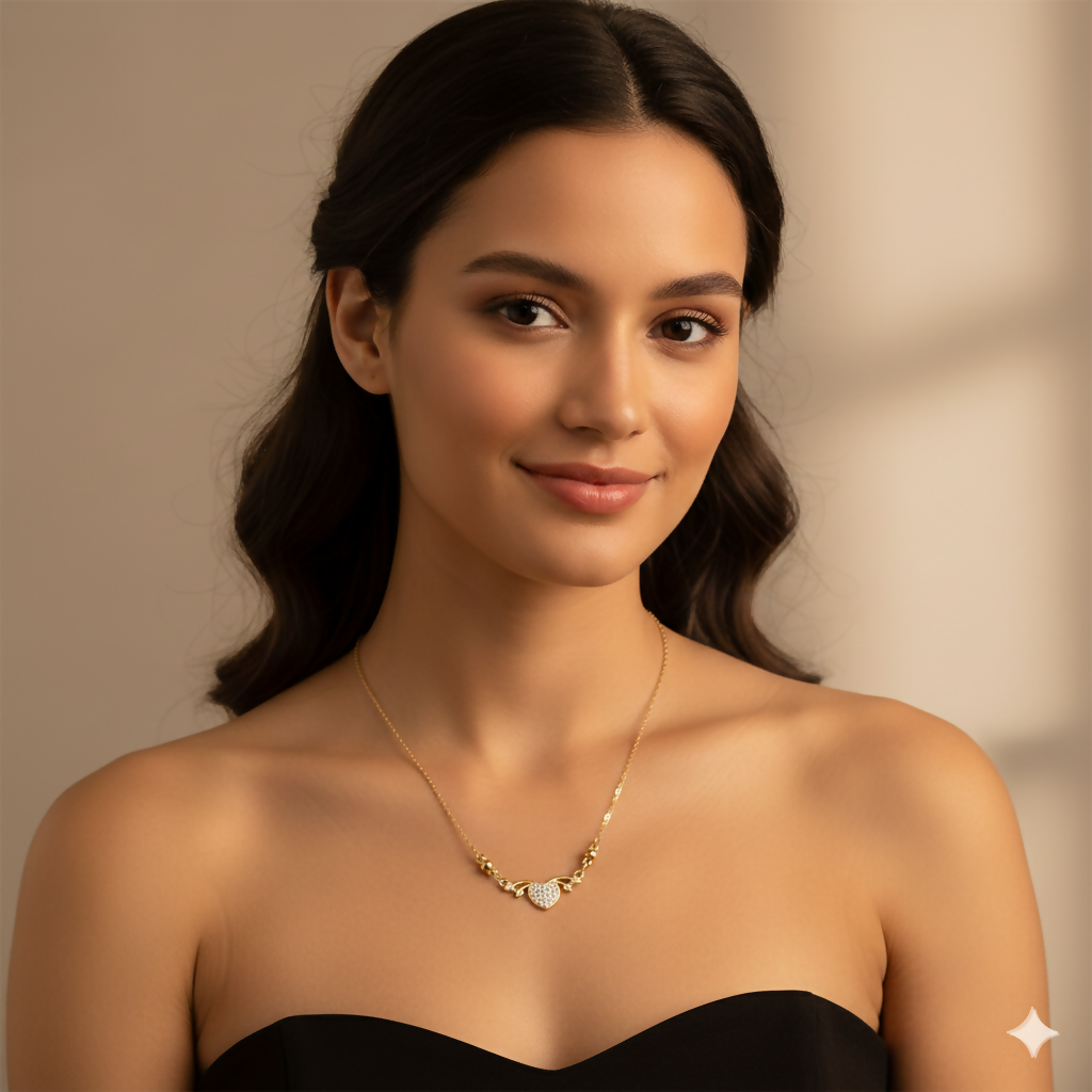 Elegant gold tone heart-shaped necklace pendant with sparkling Cubic Zirconia stones