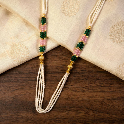 Side view of ethnic pearl mala necklace with colorful beads