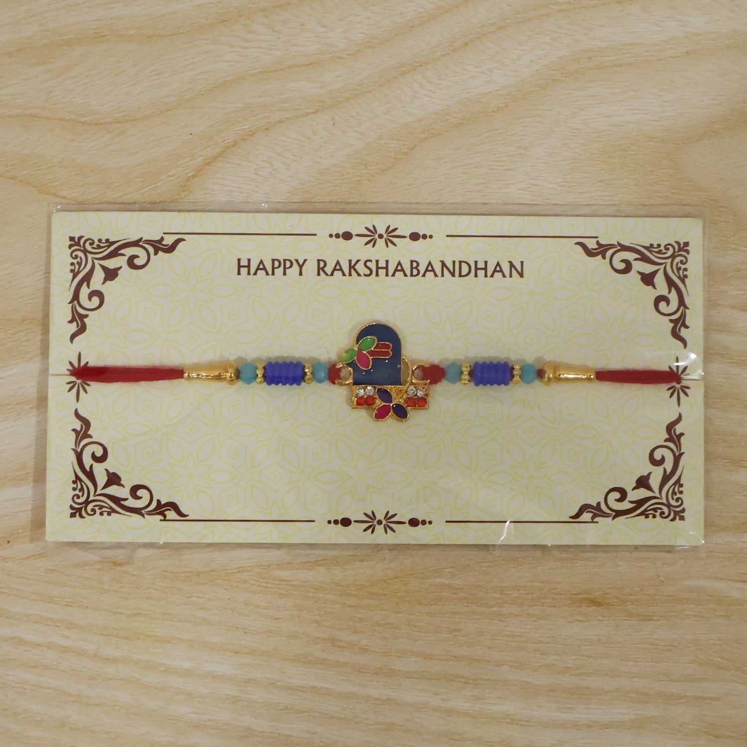 Traditional Royal Blue Shiv Rakhi with intricate design