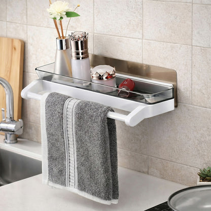 Wall-mounted bathroom shelf with integrated towel holder in modern bathroom