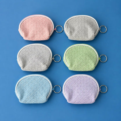 Pouch displaying smooth zipper and texture