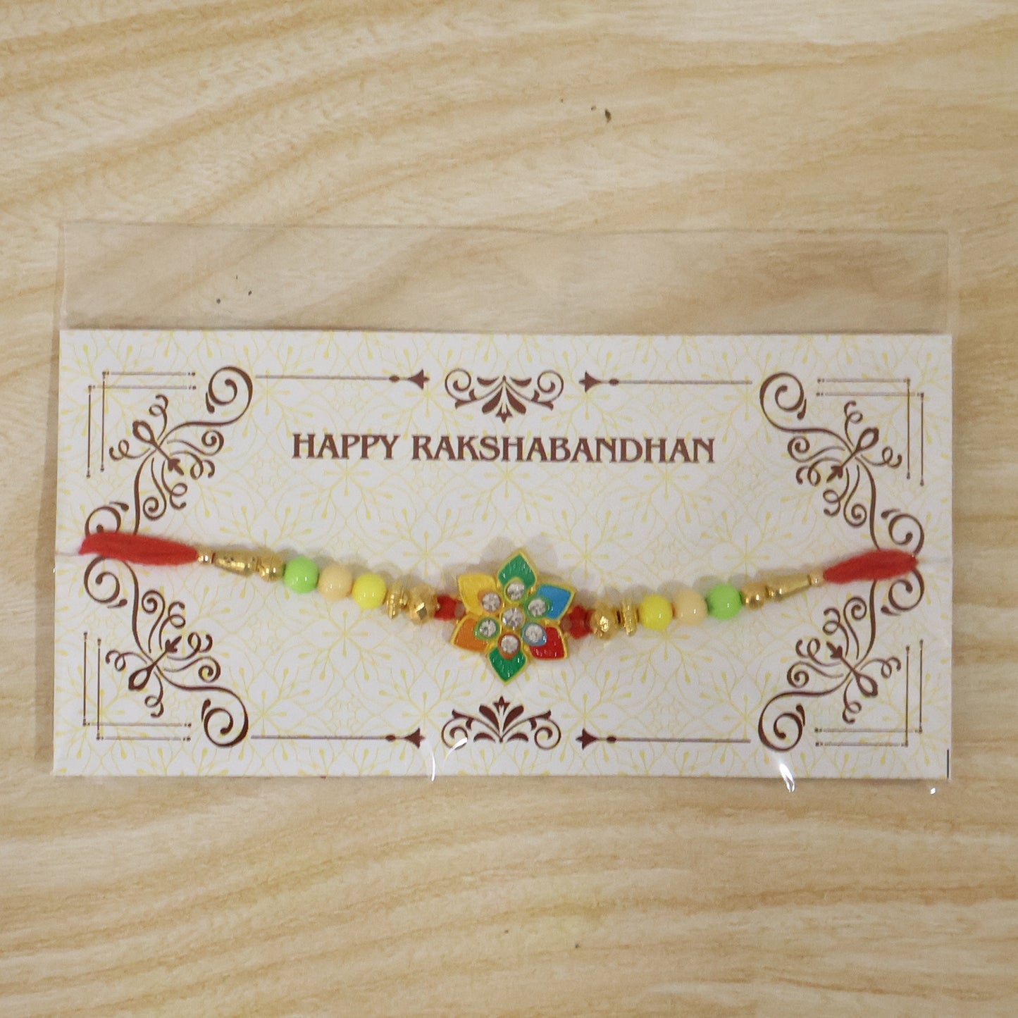 Festive designer Rakhi showcasing traditional motifs