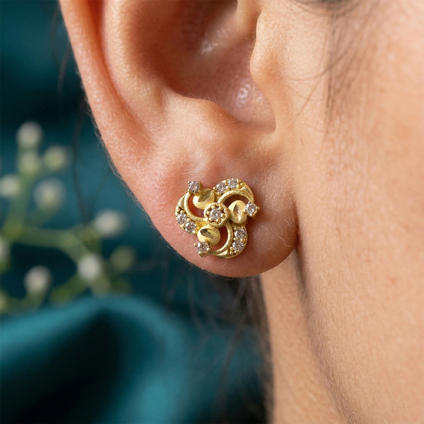 Elegant Floral Swirl Gold Stud Earrings with Crystal Detailing