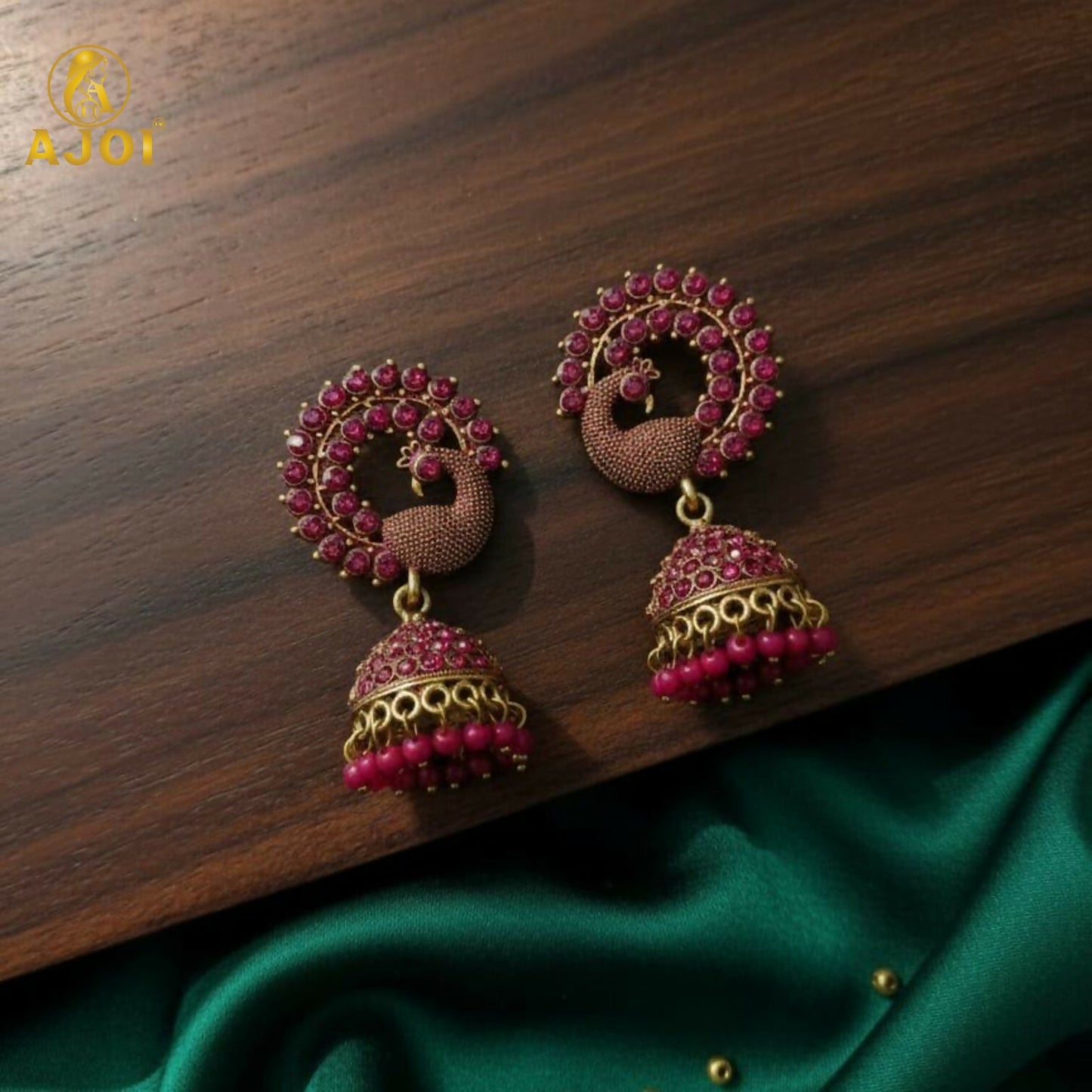 Peacock Motif Ruby-Tone Jhumka Earrings in Antique Gold Finish