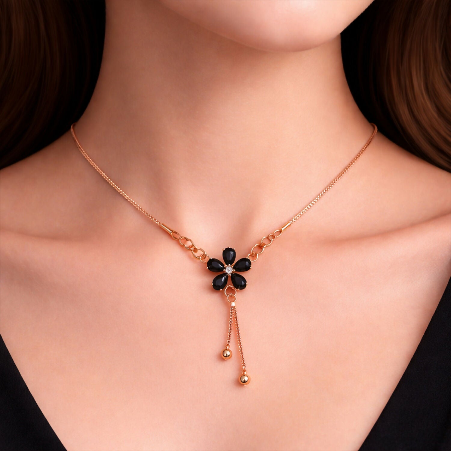 Gold finish black floral pendant necklace with elegant drop on sleek chain