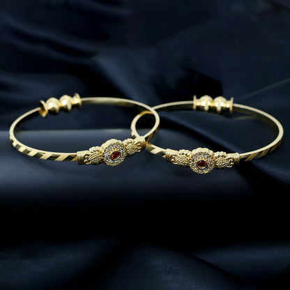 Close-up of slim textured band on floral bangle