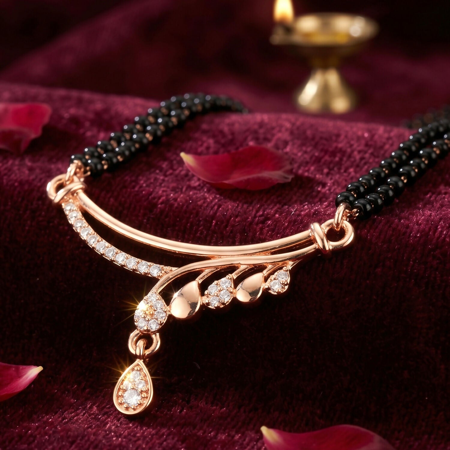 Beautiful rose gold mangalsutra with black bead chain and pear-shaped CZ drop detail