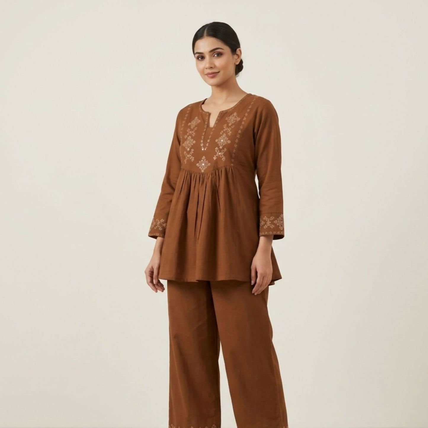 Brown floral embroidered co-ord set featuring short kurti and palazzo pants