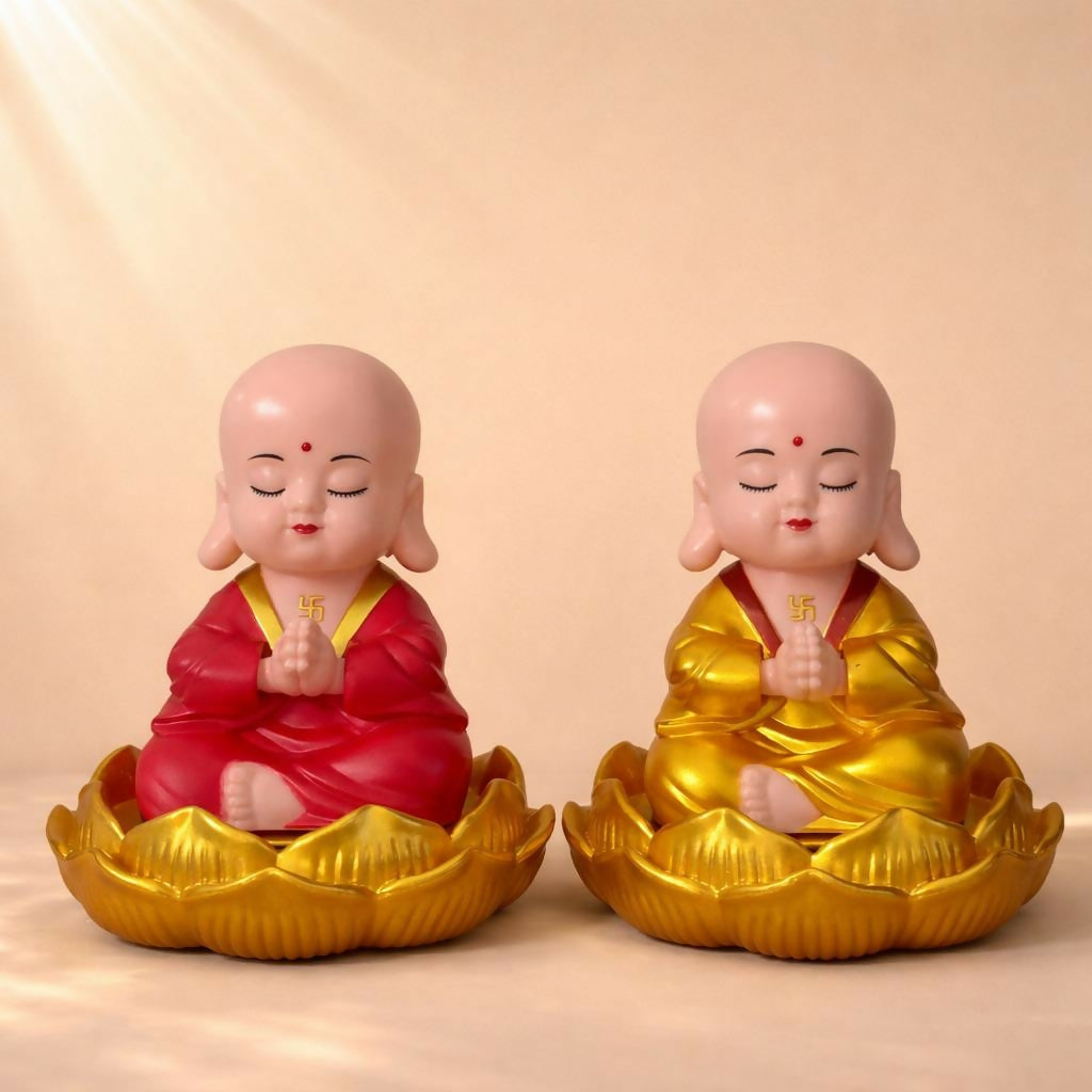 Close-up of solar powered monk figurine bobbling