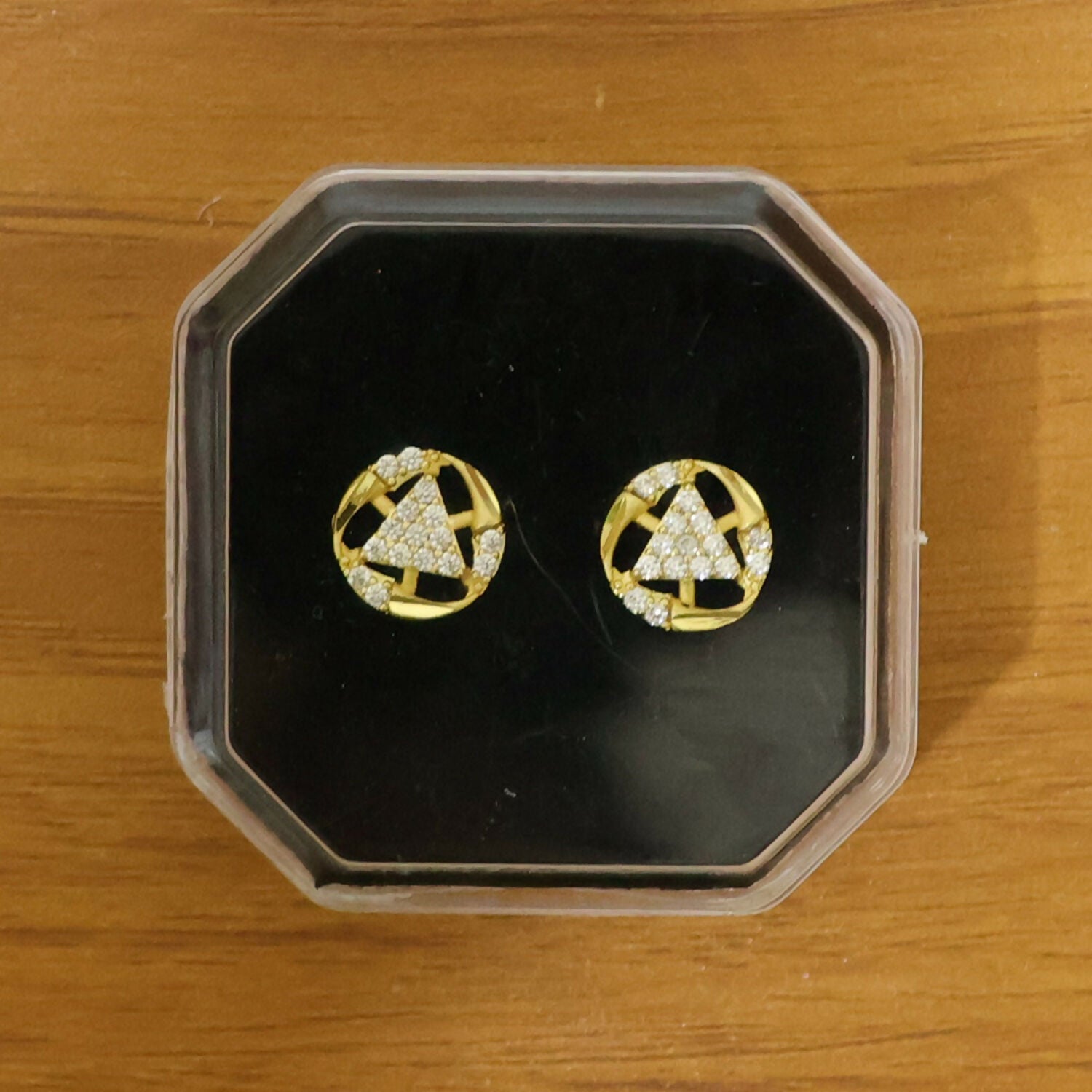 Premium gold jewelry earrings with bell shape and sparkling accents