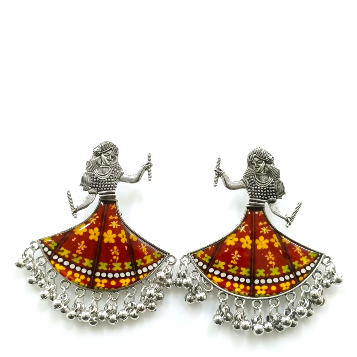 Two silver oxidized dancing girl earrings with maroon and yellow floral skirts and ghungroo drops, presented on a white