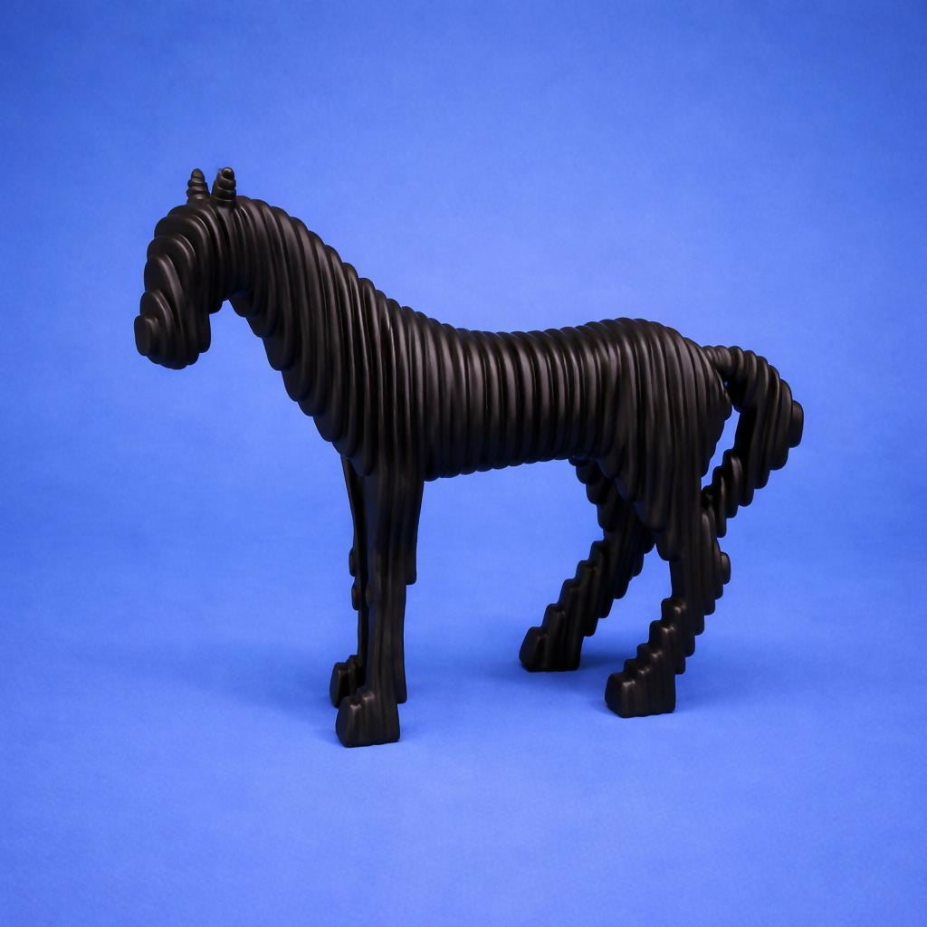 Abstract horse sculpture displayed on shelf