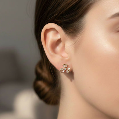 Elegant floral CZ earrings with gold finish displayed for everyday wear