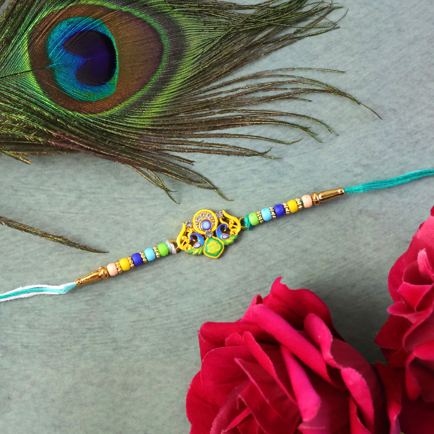 Yellow thread Rakhi with detailed decorative beads