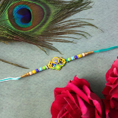 Yellow thread Rakhi with detailed decorative beads