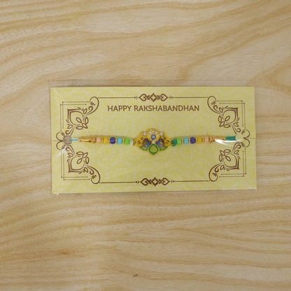 Traditional Rakhi with Colorful Beads & Yellow Thread (1 Pc)
