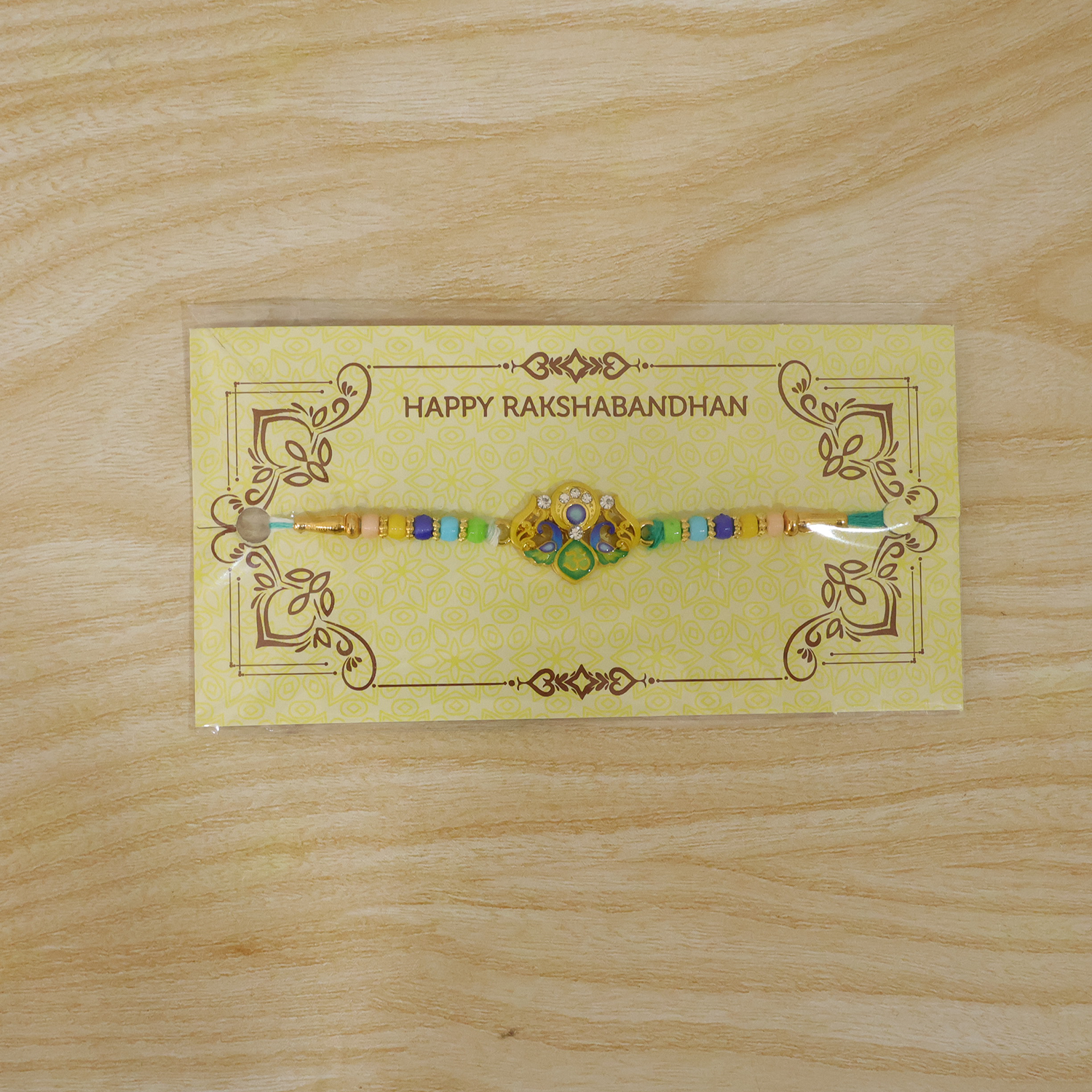 Live view of peacock design premium rakhi on hand