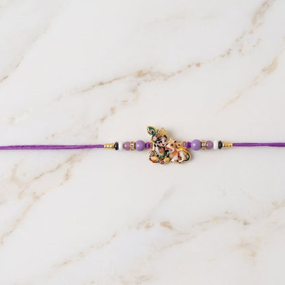 Bal Krishna rakhi displaying colorful beads on thread