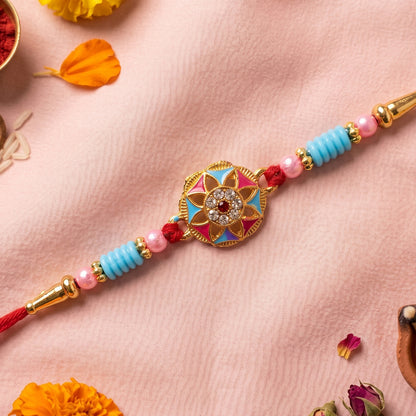 Close-up of floral stone centerpiece with colorful beads