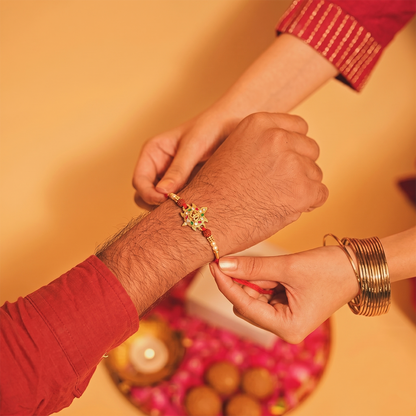 Side view of Divine Om Symbol Rakhi with colorful stones
