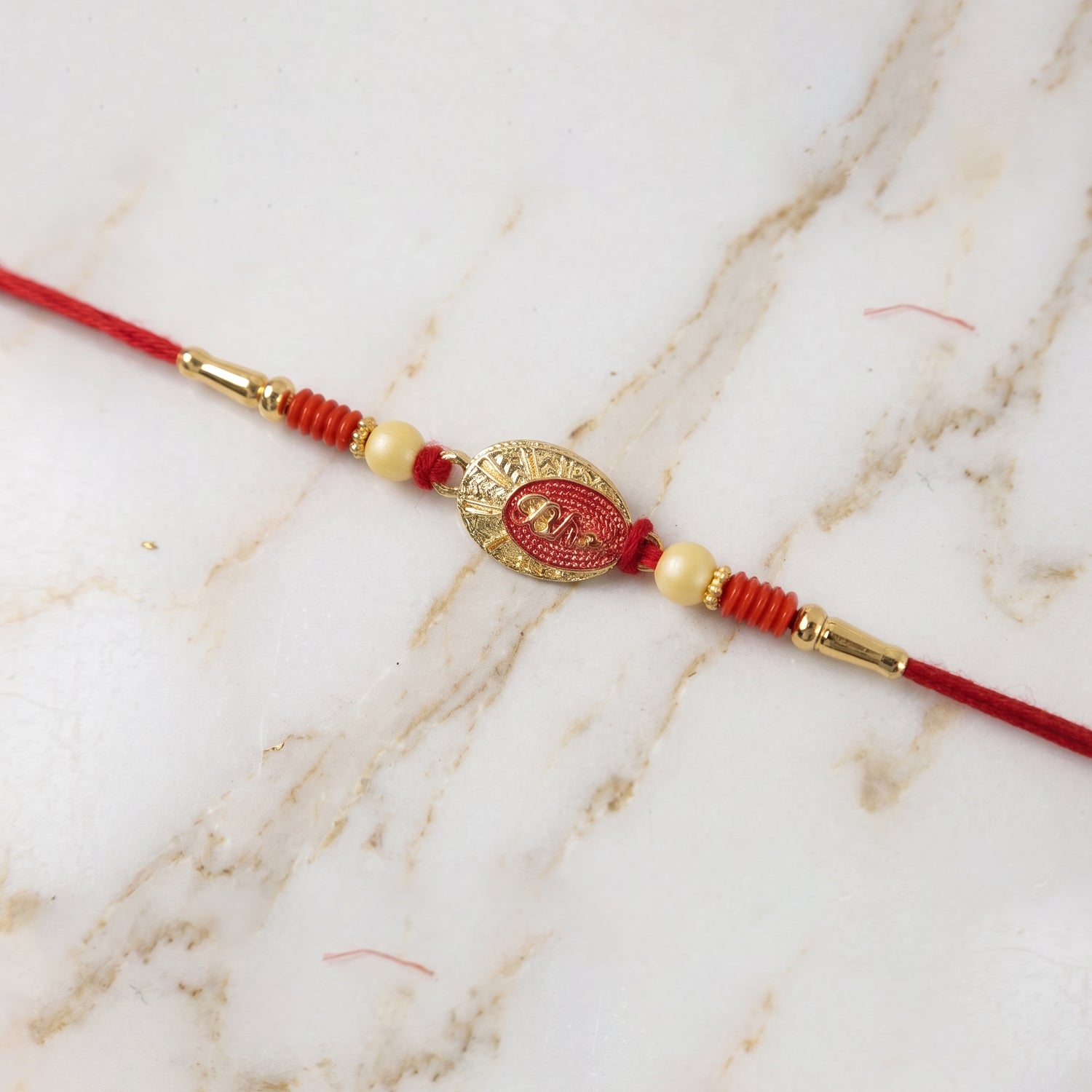 Multiple angles of Traditional Bhai Text Rakhi showcasing design