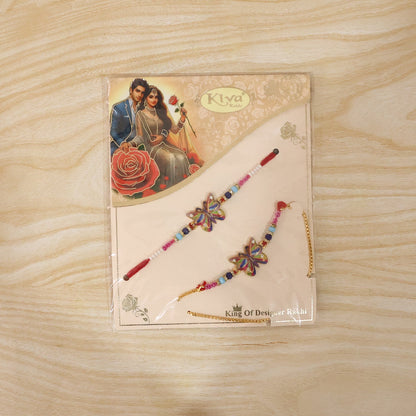 Rainbow Butterfly Designer Rakhi on a hand showing scale
