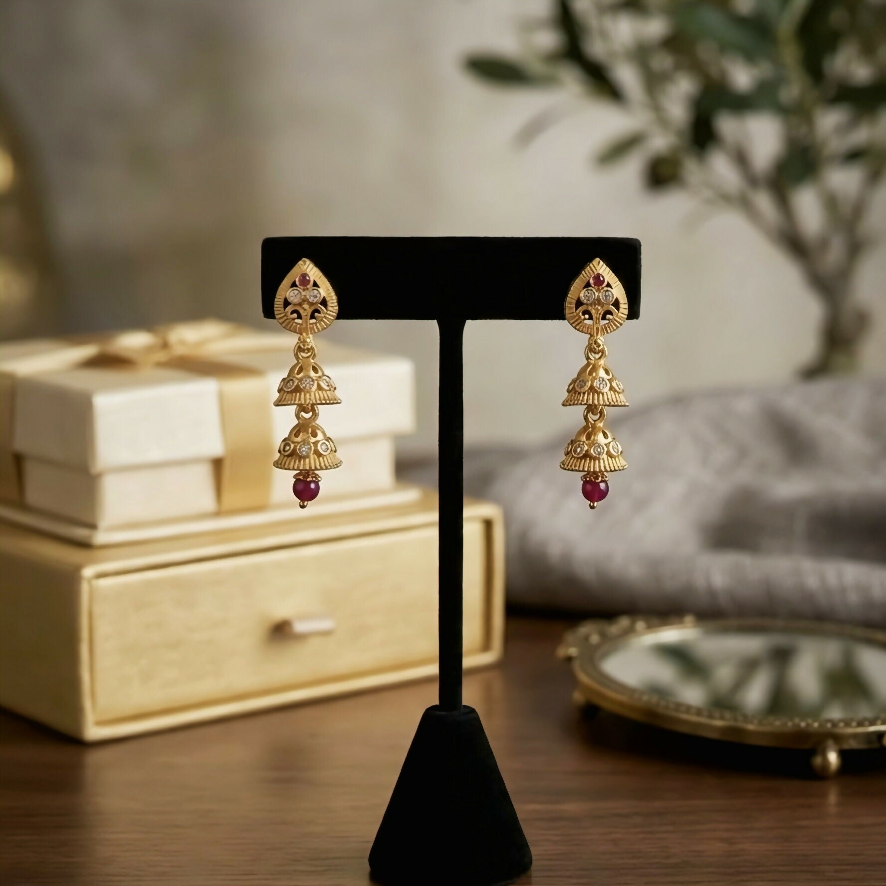 Exquisite Gold-Plated Double Layer Jhumka Earrings with Ruby and Stone Accents