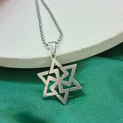 Side angle of Geometric Star Chain Pendant showing chain details