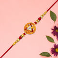 Gold-Plated Round Rakhi – Traditional Elegance for Brother