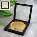 Yellow Buddha Bead Bracelet – Elegant Spiritual Charm Accessory