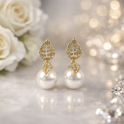 Gold leaf pearl drop earrings front view
