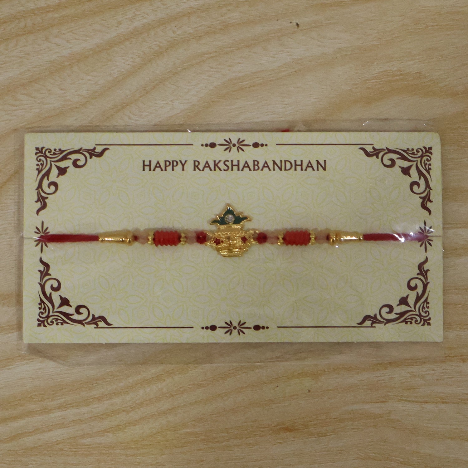 Sacred Kalash Designer Rakhi showcasing thread and beads