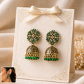 Jhumka Earrings – Elegant Antique Golden Finish with Green Stones