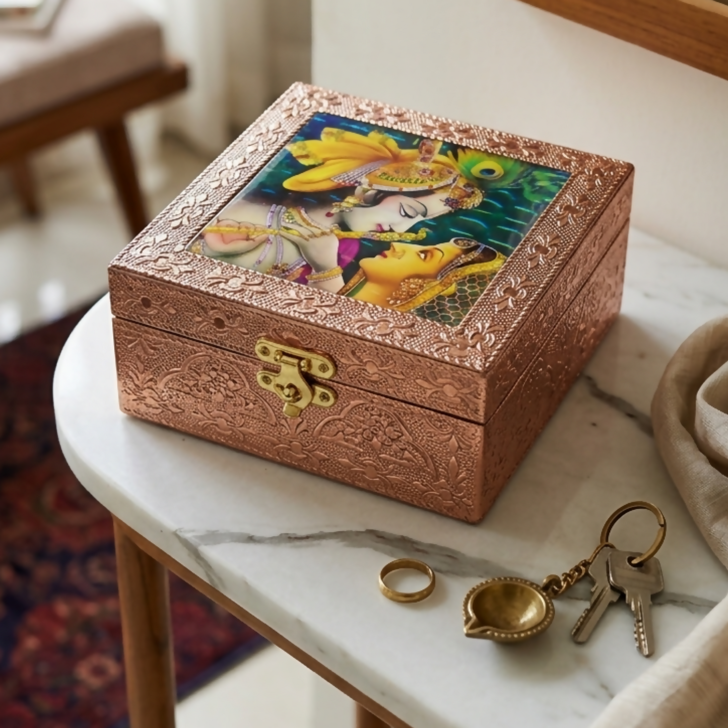 Lid close-up showing Radha Krishna embossed artwork on jewelry box
