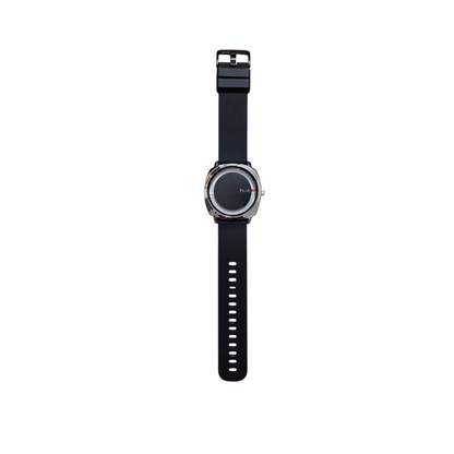 Top-down view of the analog wrist watch, showcasing the strap texture.