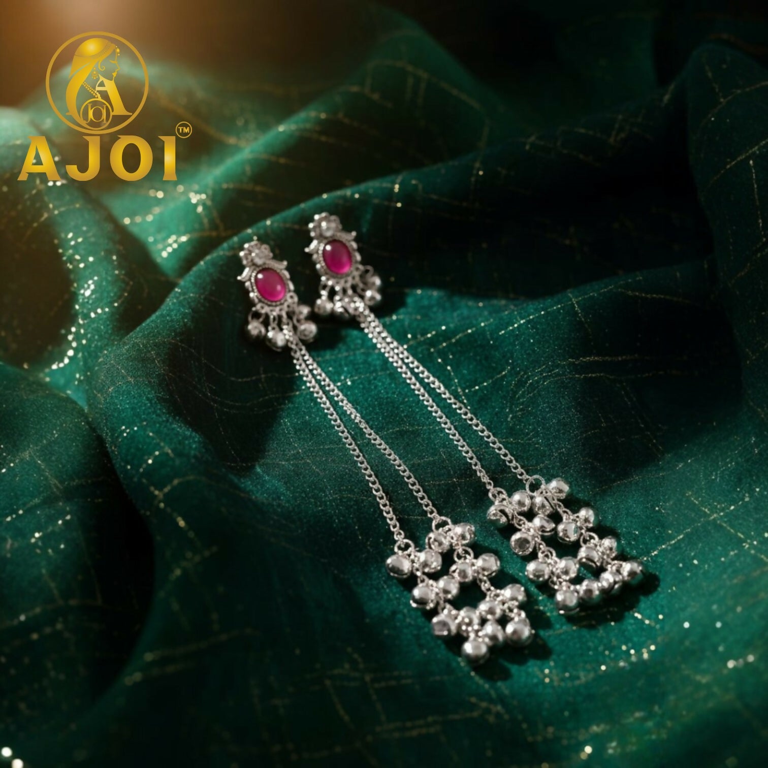 Kashmiri silver-tone ruby chain drop earrings showing deep ruby stone and cascading chains