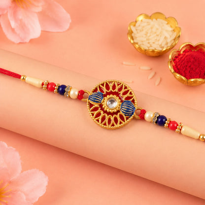 Side view of the Golden Meenakari Kundan Rakhi showcasing its craftsmanship.