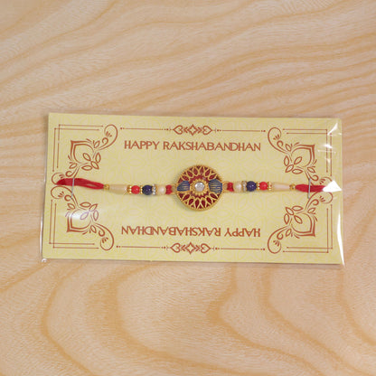 Back view of the Golden Meenakari Kundan Rakhi thread.