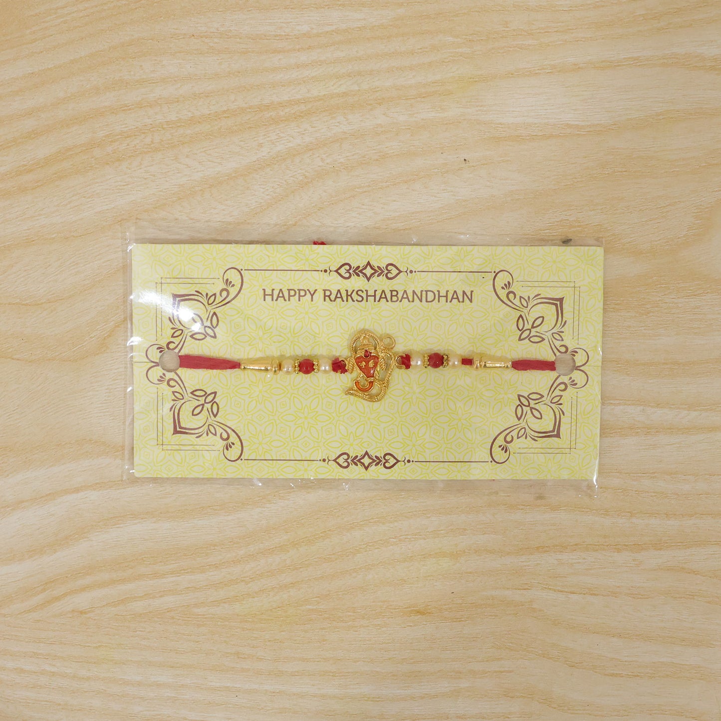 Lord Ganesha Rakhi – Designer Multicolor Beads for Brother