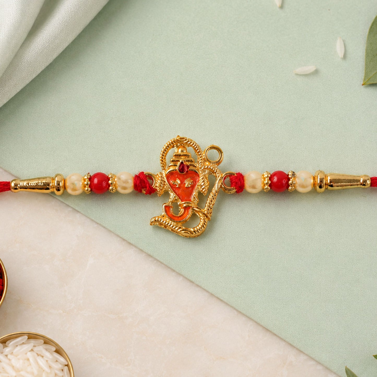 Lord Ganesha Rakhi – Designer Multicolor Beads for Brother
