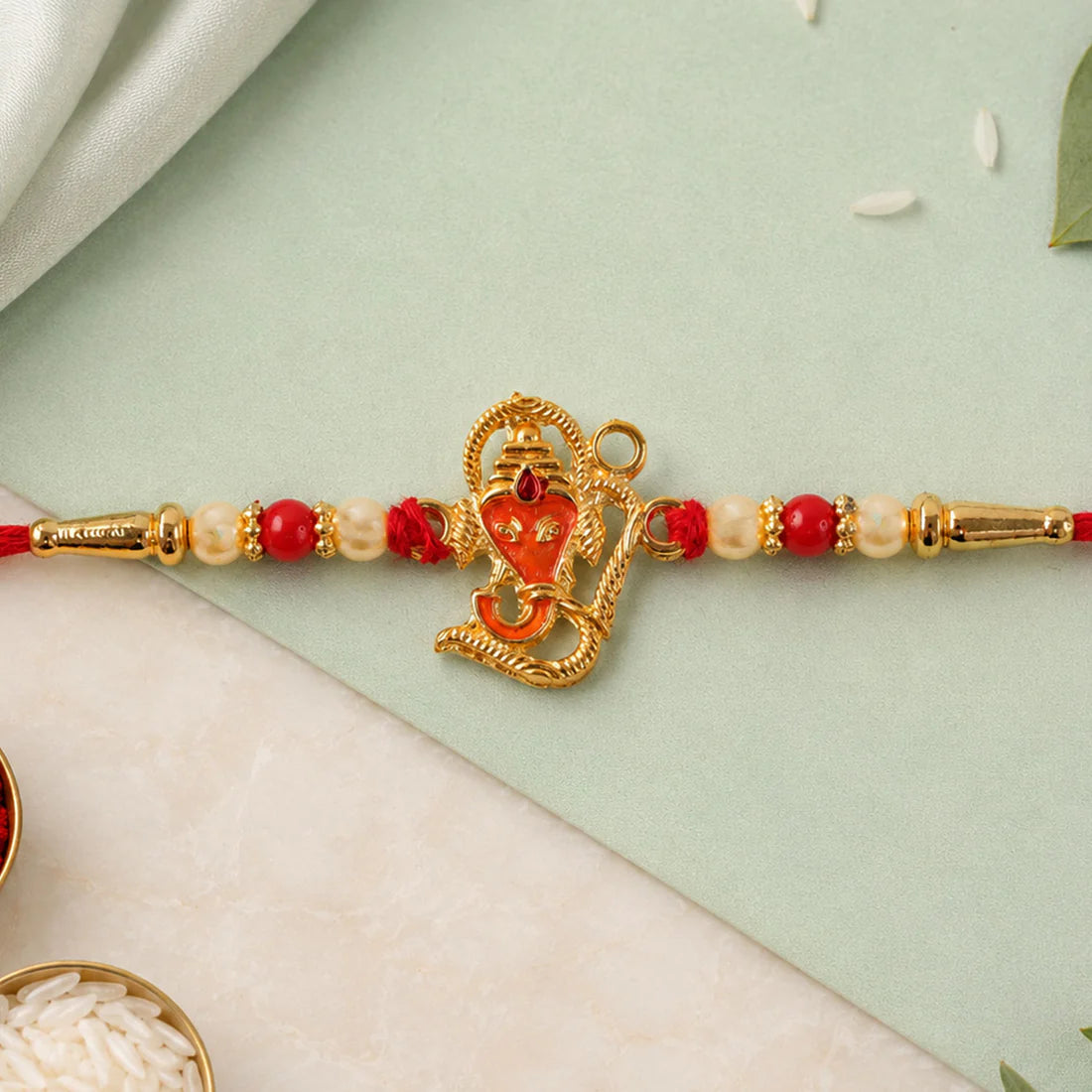 Lord Ganesha Rakhi – Designer Multicolor Beads for Brother