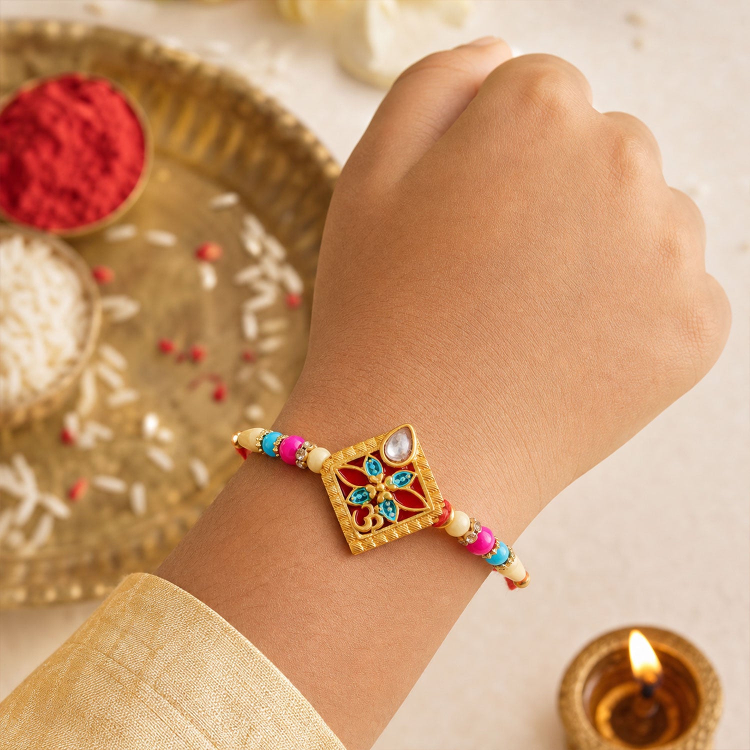 Traditional Diamond Shape Rakhi for brother, featuring elegant stone and bead artistry.