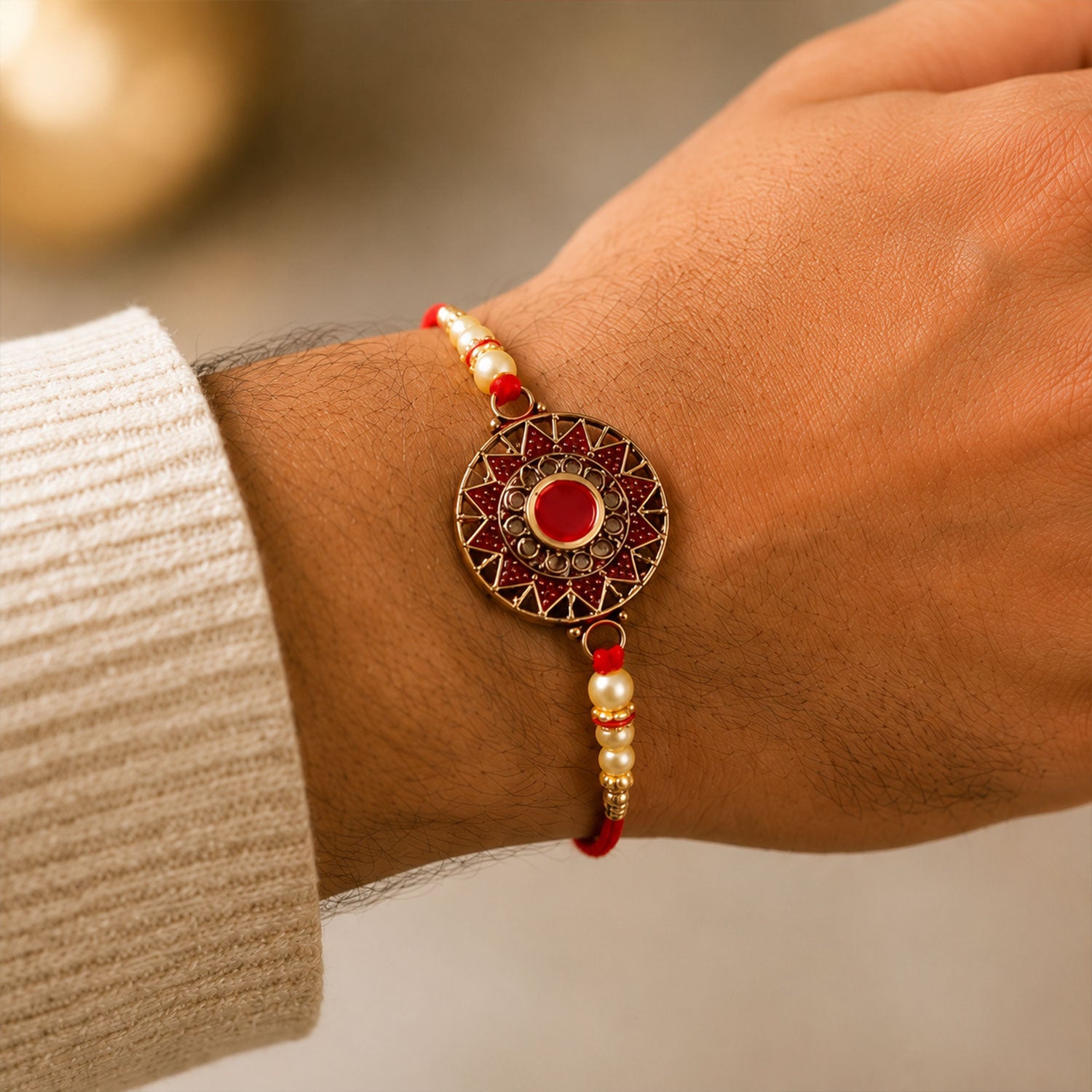 Premium Traditional Rakhi – Red Stone & Pearl Beads Elegant Design