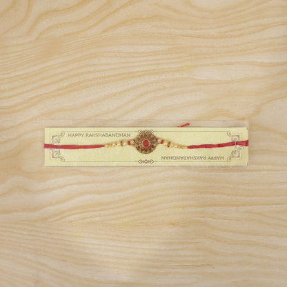 Premium Traditional Rakhi – Red Stone & Pearl Beads Elegant Design